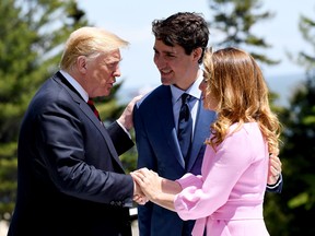 The Prime Minister of Canada, Justin Trudeau, and wife Sophie Gregoire greet U.S. President Donald Trump during the G7 official welcome at Le Manoir Richelieu on June 8, 2018 in Quebec City.