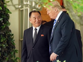 President Donald Trump talks with Kim Yong Chol, left, former North Korean military intelligence chief and one of leader Kim Jong Un's closest aides, as they walk from the Oval Office at the White House in Washington, Friday, June 1, 2018.