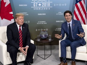 Canada's Prime Minister Justin Trudeau meets with U.S. President Donald Trump at the G7 leaders summit in La Malbaie, Que., on Friday, June 8, 2018. Prior to boarding Air Force One, the U.S. president took to Twitter to deride Canada and Europe on a familiar topic: what he sees as their unfair trade practices.