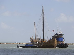 In a Oct. 10, 2014 photo, he last remaining Columbus ship replica, La Nina, travels through Corpus Christi Bay as it is prepared to be berthed at a new location at the Lawrence Street T-Head behind Joe's Crab Shack in Corpus Christi, Texas. The Corpus Christi City Council has authorized the Columbus Sailing Association's request to find an interested buyer for its copy of the Niña, the Corpus Christi Caller Times reported. The ship it suffered extensive damage during Hurricane Harvey.