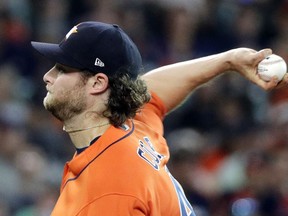 Houston Astros starting pitcher Gerrit Cole throws against the Boston Red Sox during the first inning of a baseball game Friday, June 1, 2018, in Houston.