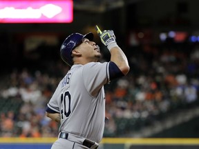 Tampa Bay Rays' Wilson Ramos celebrates after hitting a two-run home run against the Houston Astros during the first inning of a baseball game Monday, June 18, 2018, in Houston.
