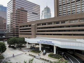 This Friday, June 1, 2018 photo shows Baylor St. Luke's Medical Center in Houston. Baylor St. Luke's Medical Center has suspended all medical procedures in its renowned heart transplant program following the deaths this year of at least three patients. Baylor St. Luke's Medical Center announced Friday, June 1, 2018 that the transplant program will be inactive for 14 days as administrators assess what's gone awry with operations.
