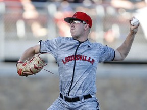 Louisville's Nick Bennett pitches the ball during an NCAA college baseball tournament regional game against Texas Tech, Saturday, June 2, 2018, in Lubbock, Texas.