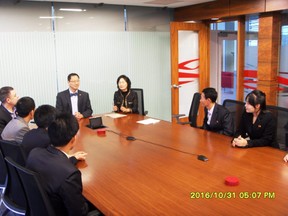 Visiting North Korean scholars meet with UBC president Santa Ono in 2016.