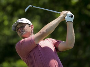 Matt Parziale plays his shot from the 11th tee during the third round of the U.S. Open Golf Championship, Saturday, June 16, 2018, in Southampton, N.Y.