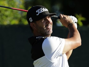 Scott Piercy plays his shot from the fourth tee during the first round of the U.S. Open Golf Championship, Thursday, June 14, 2018, in Southampton, N.Y.