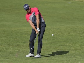 Henrik Stenson, of Sweden, hits on the 13th fairway during the third round of the U.S. Open Golf Championship, Saturday, June 16, 2018, in Southampton, N.Y.