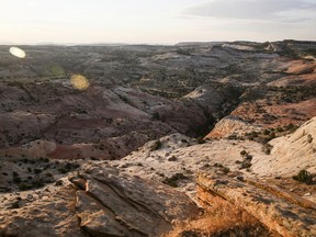 This July 9, 2017 photo, shows a view of Grand Staircase-Escalante National Monument in Utah.  A Canadian company is telling investors it plans to mine on Utah lands that were cut out of the Grand Staircase-Escalante National Monument by President Trump in a move that is angering environmental groups who are suing to reverse the downsizing.