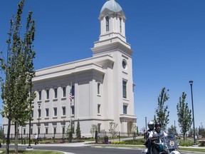 The "Temple Riders", a faith-based motorcycle club visits the Cedar City Utah Temple as a stop on their biennial national rally Monday, June 11, 2018. The Temple Riders, a Mormon motorcycle club is holding its biennial gathering in southern Utah, where about 125 members from across the country are riding together through scenic parts of the region.