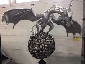 A dragon sculpture that went missing from a Nanaimo, B.C., park is shown in a handout photo. Artist Heather Wall says she believes someone would have planned carefully to take the 35 kilogram, 1.5 metre wide aluminum dragon from its three-metre perch.