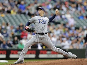 Tampa Bay Rays starting pitcher Blake Snell works against the Seattle Mariners during the first inning of a baseball game on Sunday, June 3, 2018, in Seattle.