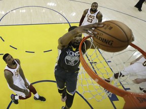 Kevin Durant of the Golden State Warriors goes hard to the basket for two of his 26 points during Game 2 action in the NBA Finals in Oakland on Sunday. The Warriors were 122-103 winners over the Cleveland Cavaliers, giving them  a 2-0 lead in the series heading to Cleveland for the next two games.