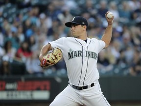 Seattle Mariners starting pitcher Marco Gonzales throws against the Tampa Bay Rays during the first inning of a baseball game, Saturday, June 2, 2018, in Seattle.
