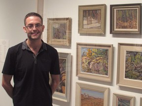 David Smith, the assistant curator of the University of Lethbridge Art Gallery, checks out works from the Group of Seven artists in Lethbridge, Friday, June 15, 2018. The university was bequeathed a huge collection with the death of a collector.