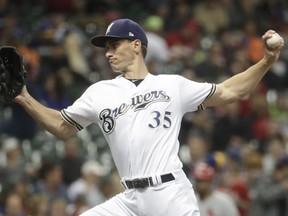 Milwaukee Brewers starting pitcher Brent Suter throws during the first inning of a baseball game against the St. Louis Cardinals Thursday, June 21, 2018, in Milwaukee.