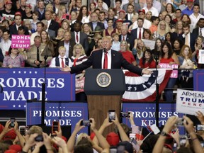 In this May 29, 2018, photo, President Donald Trump speaks at a rally in Nashville, Tenn. Trump fabricated history when it came to the 2016 election, his achievements on the opioid epidemic and a congressman's voting record on taxes.