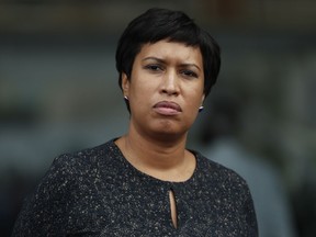 FILE - In this Oct. 5, 2017, file photo, District of Columbia Mayor Muriel Bowser pauses during a news conference in Washington. On June 19, 2018, Bowser was Democratic Party nomination as she seeks a second term in office.