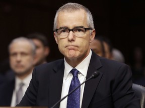 FILE - In this May 11, 2017, file photo then-acting FBI Director Andrew McCabe listens on Capitol Hill in Washington. The Justice Department has repeatedly refused to provide McCabe with documents related to his firing, according to a lawsuit filed on his behalf Tuesday, June 12, 2018. McCabe was fired less than two days before his scheduled retirement amid allegations that he had misled internal investigators.
