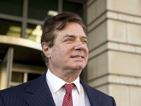 In this Thursday, Nov. 2, 2017, file photo, Paul Manafort, Donald Trump's former campaign chairman, leaves Federal District Court, in Washington.