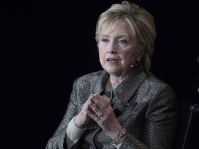 FILE - In this April 6, 2017, file photo, former Secretary of State Hillary Clinton speaks in New York. The Justice Department's internal watchdog is expected to criticize the FBI's handling of the Clinton email investigation, stepping into a political minefield as it details how a determinedly non-partisan law enforcement agency came to be entangled in the 2016 presidential race. President Donald Trump will look to the inspector general report to provide a fresh line of attack against the FBI's two former top officials, Director James Comey and his deputy, Andrew McCabe, as he claims that a politically tainted bureau tried to undermine his campaign and, through the Russia investigation, his presidency.