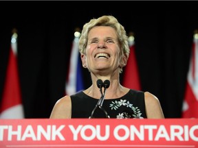 Outgoing Ontario Premier Kathleen Wynne speaks during a press conference at the Ontario Legislature at Queen's Park in Toronto on Friday, June 8, 2018.