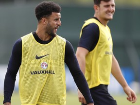 England's Kyle Walker smiles as he takes part in a training session for the England team at the 2018 soccer World Cup, in the Spartak Zelenogorsk ground, Zelenogorsk near St. Petersburg, Russia, Thursday, June 21, 2018.