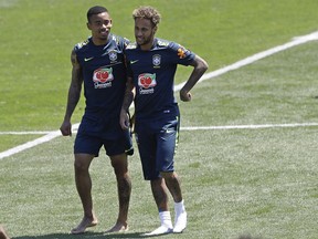 Brazil's Neymar, right, and Gabriel Jesus attend a training session in Sochi, Russia, Tuesday, June 12, 2018. Brazil will face Switzerland on June 17 in the group E for the soccer World Cup.