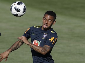 Brazil's Gabriel Jesus heads the ball during a training session in Sochi, Russia, Thursday, June 14, 2018. Brazil will face Switzerland on June 17 in the group E for the soccer World Cup.
