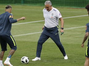 Brazil head coach Tite, right, and Neymar practice during a training session in Sochi, Russia, Tuesday, June 19, 2018. Brazil will face Costa Rica on June 22 in the group E for the soccer World Cup.