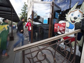 Soccer fans from different countries gather at the main ticket office in Moscow, Russia, Thursday, June 14, 2018. Scalpers are still very visible at the World Cup, despite FIFA and Russia's claims they've cracked down on illicit ticket sales.