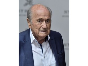 Former FIFA President Sepp Blatter leaves a hotel in Moscow, Russia, Thursday, June 21, 2018. Former FIFA President Sepp Blatter says he met Vladimir Putin at the Kremlin and talked about the Russia team's good start to the World Cup.