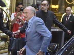Former FIFA President Joseph Blatter arrives at a hotel in Moscow, Russia, Tuesday, June 19, 2018.