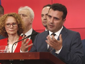 CORRECTS TO NORTH MACEDONIA, NOT NORTHERN - Macedonian Prime Minister Zoran Zeav addresses the media during a news conference in the Government building in Skopje, Macedonia, Tuesday, June 12, 2018. The prime ministers of Greece and Macedonia say they have agreed on "Republic of North Macedonia" as the new name for the Balkan country, ending a bitter 27-year dispute that had prevented the former Yugoslav republic from joining international institutions such as NATO.