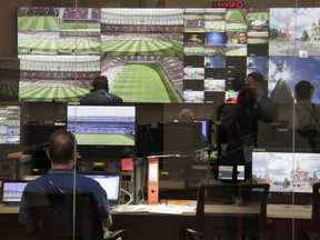 Employees of the 2018 World Cup International Broadcast Centre (IBC) work at a facility of the centre in Moscow, Russia, Saturday, June 9, 2018.