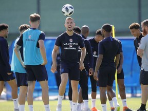 England's Jordan Henderson, centre, and his teammates attend England's official training in Zelenogorsk near St. Petersburg, Russia, Saturday, June 23, 2018 on the eve of the group G match between Panama and England at the 2018 soccer World Cup.