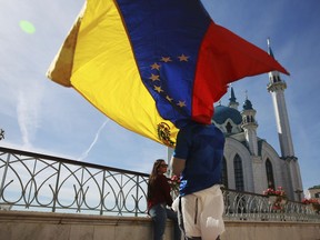 Fans for Colombia visit the Kul Sharif Mosque during the 2018 soccer World Cup in Kazan, Russia, Friday, June 22, 2018.