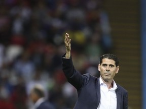 Spain head coach Fernando Hierro gestures during the group B match between Iran and Spain at the 2018 soccer World Cup in the Kazan Arena in Kazan, Russia, Wednesday, June 20, 2018.