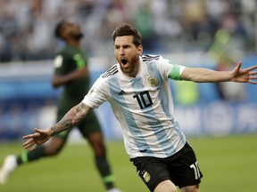 Argentina's Lionel Messi celebrates after scoring the opening goal of his team during the group D match between Argentina and Nigeria, at the 2018 soccer World Cup in the St. Petersburg Stadium in St. Petersburg, Russia, Tuesday, June 26, 2018.