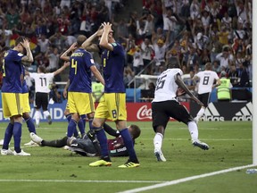 Sweden players reacts after Germany's Toni Kroos, right, scores his side's second goal during the group F match between Germany and Sweden at the 2018 soccer World Cup in the Fisht Stadium in Sochi, Russia, Saturday, June 23, 2018.