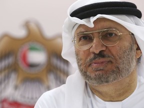Emirati Minister of State for Foreign Affairs Anwar Gargash speaks to journalists in Dubai, United Arab Emirates, Monday, June 18, 2018. The UAE is part of a Saudi-led coalition fighting against Shiite rebels for control of Yemen's port city of Hodeida. Gargash said Monday that the battle for Hodeida is aimed at forcing the country's Shiite rebels into negotiating an end to a yearslong war.