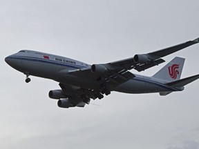 A chartered Air China 747 lands in Singapore suspected to pick up North Korea leader Kim Jong Un on Tuesday, June 12, 2018, after his summit today with U.S. leader Donald Trump.