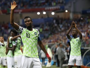 Nigeria's John Obi Mikel waves to his team's supporters after their 2-0 win in group D over Iceland at the 2018 soccer World Cup in the Volgograd Arena in Volgograd, Russia, Friday, June 22, 2018.