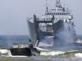 Poland's navy ships and U.S. marines take a part in a landing operation during military Exercise Baltops 2018 at the Baltic Sea near village Nemirseta in Klaipeda district, some 340 kms (211 miles) west north of the capital Vilnius, Lithuania. Lithuania, Monday, June 4, 2018. A major U.S.-led military exercise with 18,000 soldiers from 19 primarily NATO countries has kicked off in the alliance's eastern flank involving Poland and the three Baltic states of Estonia, Latvia, Lithuania.