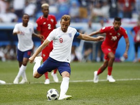 England's Harry Kane kicks a penalty to score his team's fifth goal during the group G match between England and Panama at the 2018 soccer World Cup at the Nizhny Novgorod Stadium in Nizhny Novgorod , Russia, Sunday, June 24, 2018.