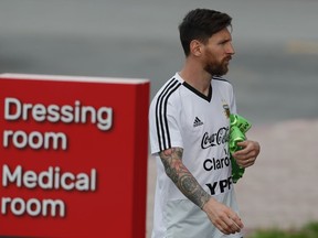 Lionel Messi arrives for a training session of Argentina at the 2018 soccer World Cup in Bronnitsy, Russia, Tuesday, June 19, 2018.