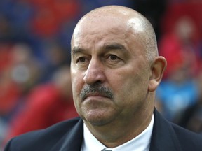 Russia's head coach Stanislav Cherchesov waits for the start of a friendly soccer match between Russia and Turkey at the VEB Arena stadium in Moscow, Russia, Tuesday, June 5, 2018.
