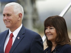 U.S. Vice President Mike Pence, left, and his wife Karen Pence arrive at Brasilia Air Base, in Brasilia, Brazil, Tuesday, June 26, 2018. Pence visits Latin America's largest and most populous nation this week, but the focus of his trip will be the deteriorating humanitarian situation in neighboring Venezuela.