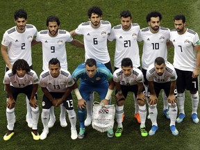 Egypt's team pose for a group photo prior to during the group A match between Saudi Arabia and Egypt at the 2018 soccer World Cup at the Volgograd Arena in Volgograd, Russia, Monday, June 25, 2018.