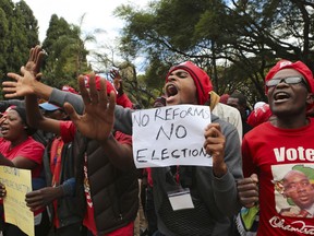 Opposition supporters march on the streets of Harare, Zimbabwe, Tuesday, June, 5, 2018. The party supporters were demanding electoral reforms ahead of a July 30 vote, the first since Robert Mugabe stepped down last year.